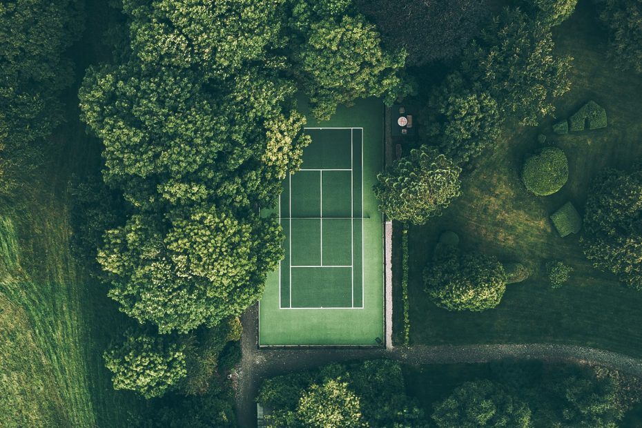 a tennis court in a tropical setting in Tobago